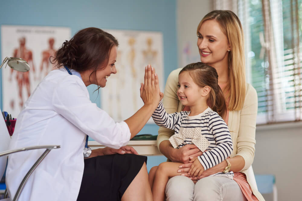 A Geri Healthcare Solutions expert delights a young patient.